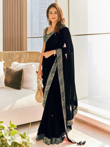 Black and gold-toned saree Solid saree with embroidered border  Has embroidered detail