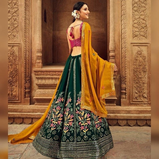 Green Colour Embroidered Attractive Party Wear Silk Lehenga choli has a Regular-fit and is Made From High-Grade Fabrics And Yarn.