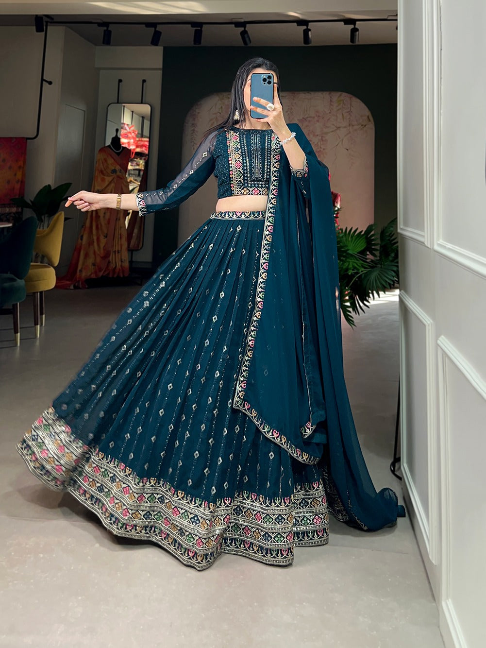 A step into festivities adorned in this embroidered lehenga choli, carry the weight of tradition and the buoyancy of modernity, a perfect equilibrium of past and present.