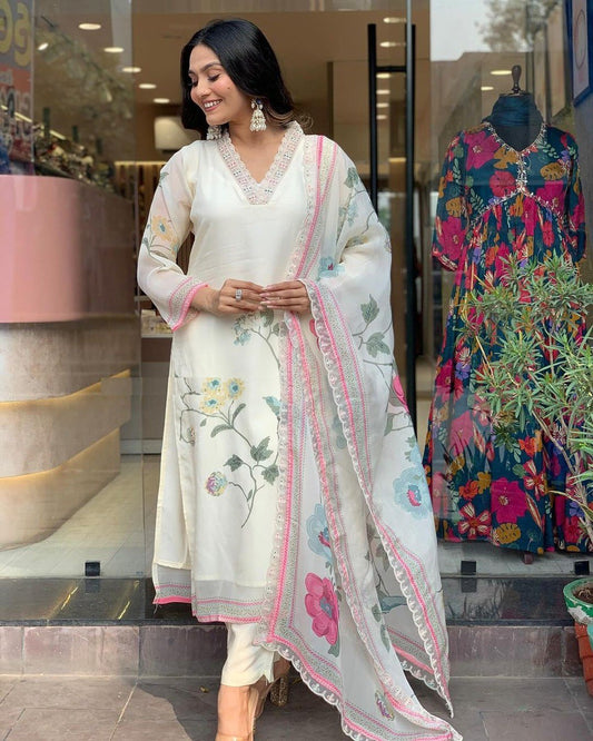 Off White Color Anarkali Suit Set seems to be a party wear outfit made from TB Silk fabric with digital Prints TB Silk Duptta wih Embroidery sequence Lace.(3-Pair)<br data-mce-fragment="1">