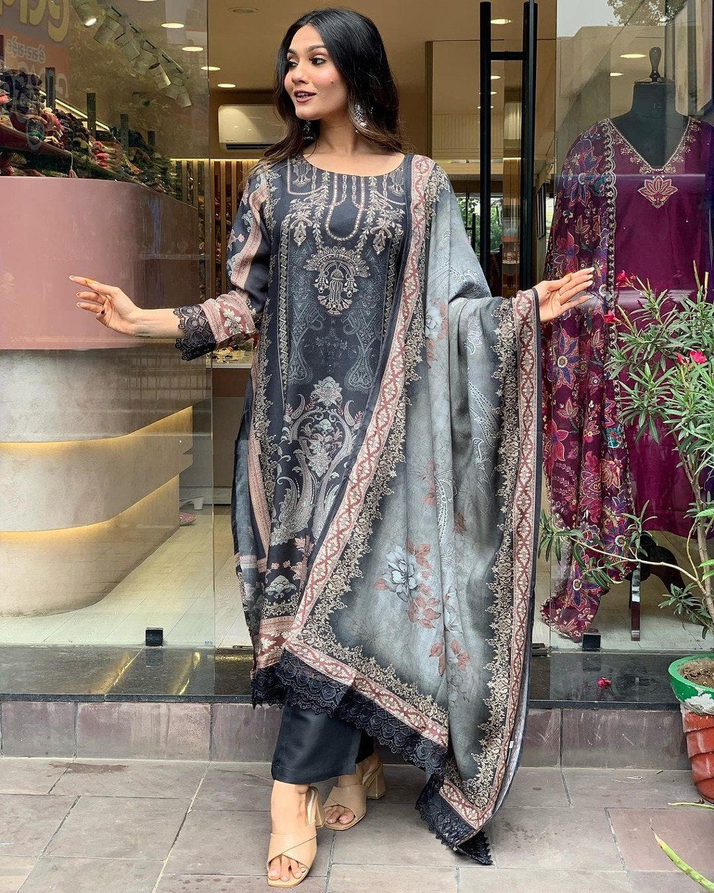 Black Anarkali Suit Set you've described seems to be a party wear outfit made from Maslin fabric with digital prints Muslin Duptta Fancy Lace Border .(3-Pair)